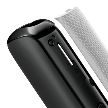 Close-up of Lunar Silver Augmented Pattern Ploom AURA front panel removed from the device, focusing on metallic sheen and textured pattern detail.
