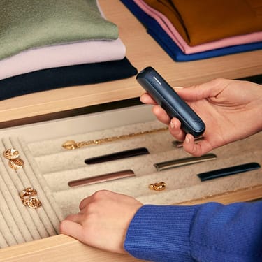 User pairing a Solo carry case with a Navy Blue Augmented Pattern Ploom AURA device, capturing a daily style choice with coordinated accessories.
