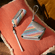 Aksesori Ploom AURA Multicolored Patterned Canvas Solo dan Duo Carry Case di dalam laci, menonjolkan corak terang dan gaya playful.